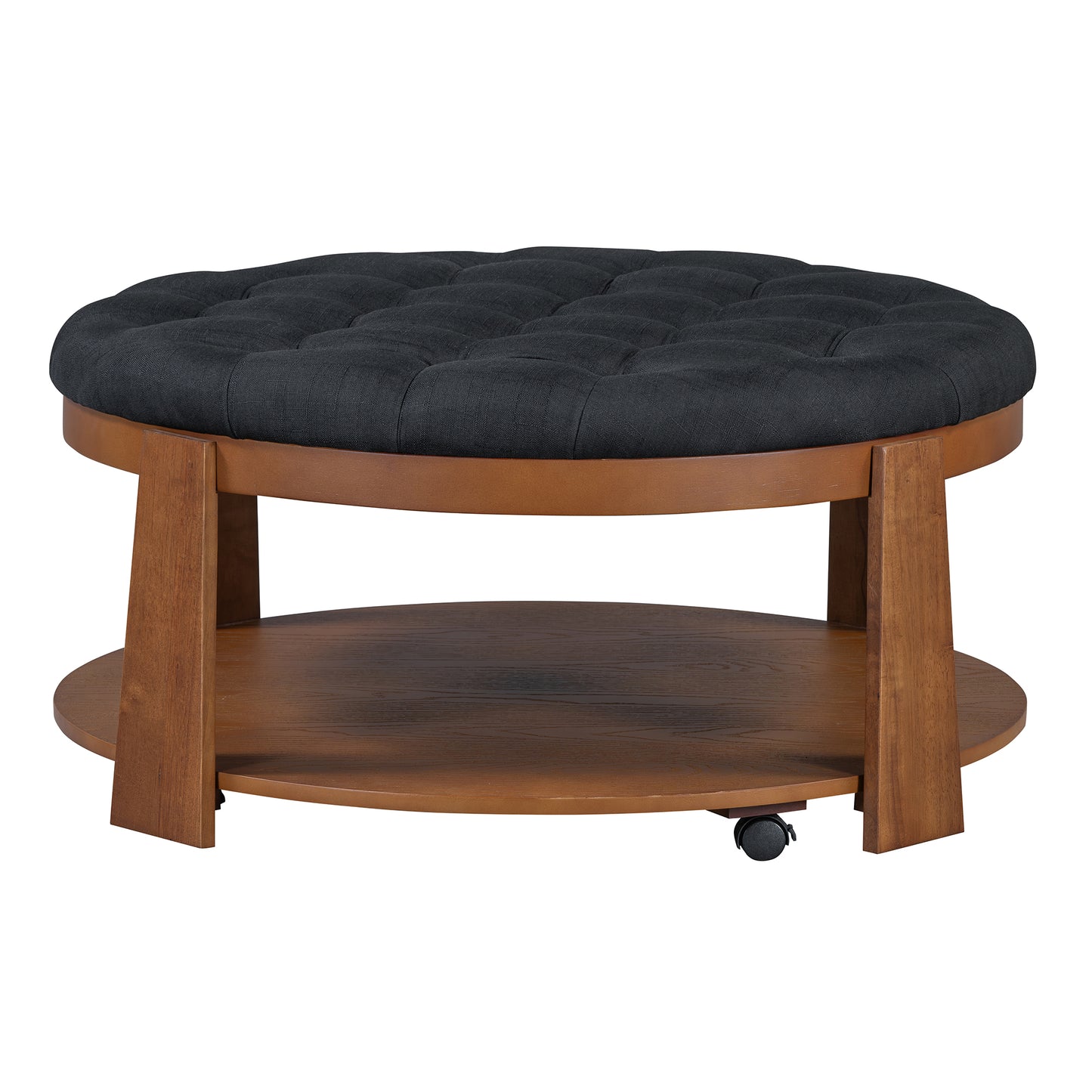 Round tufted black fabric ottoman with dark wood legs and lower shelf