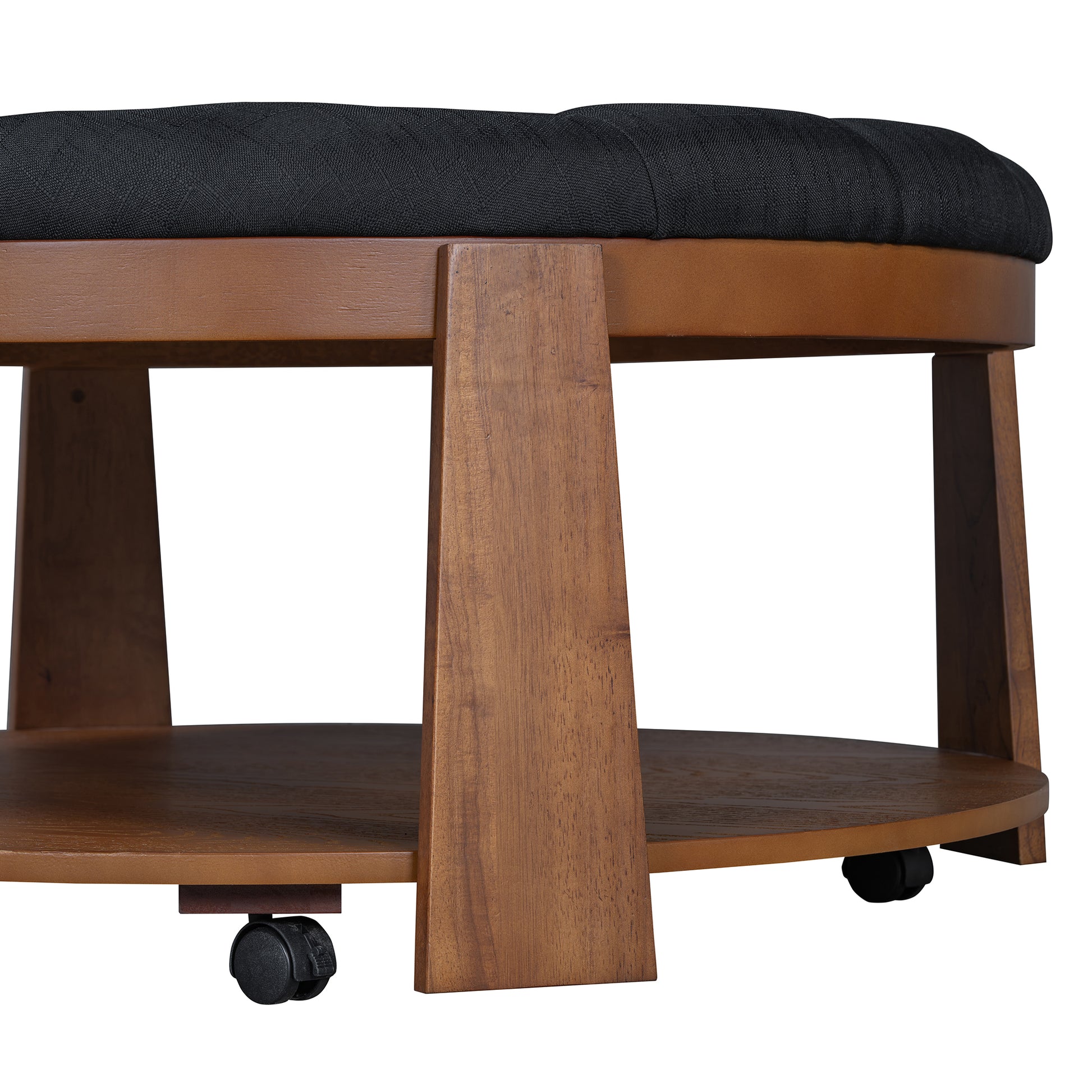 Black upholstered ottoman with wooden frame and casters