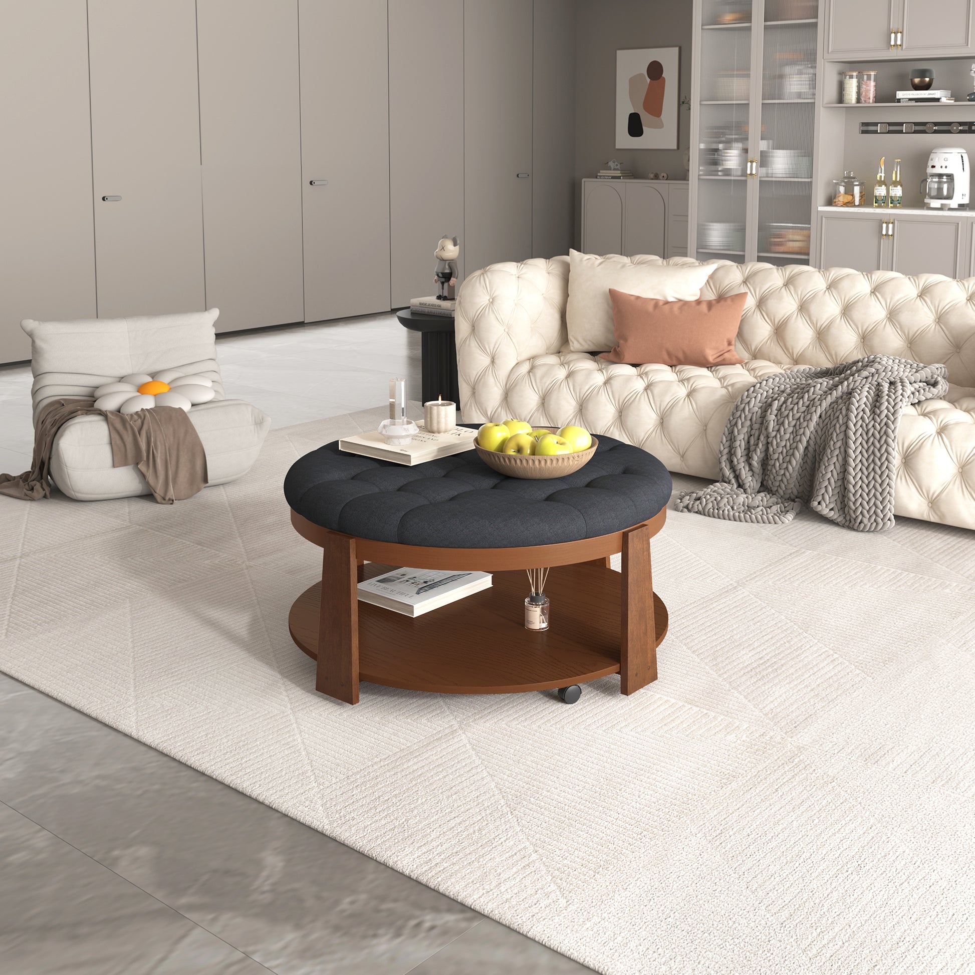 Tufted dark gray fabric ottoman coffee table with dual wooden shelves and wheels