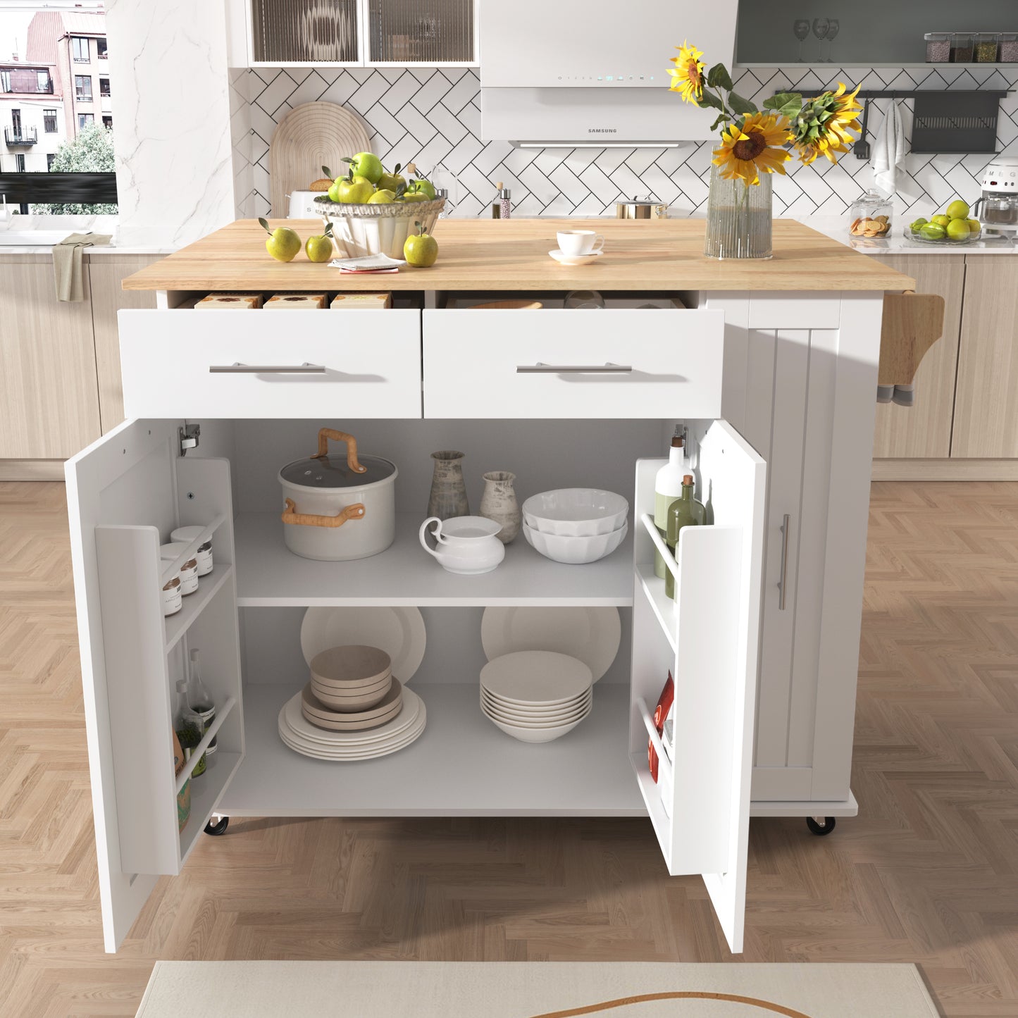 White kitchen island with butcher block top displaying cookware and dishes