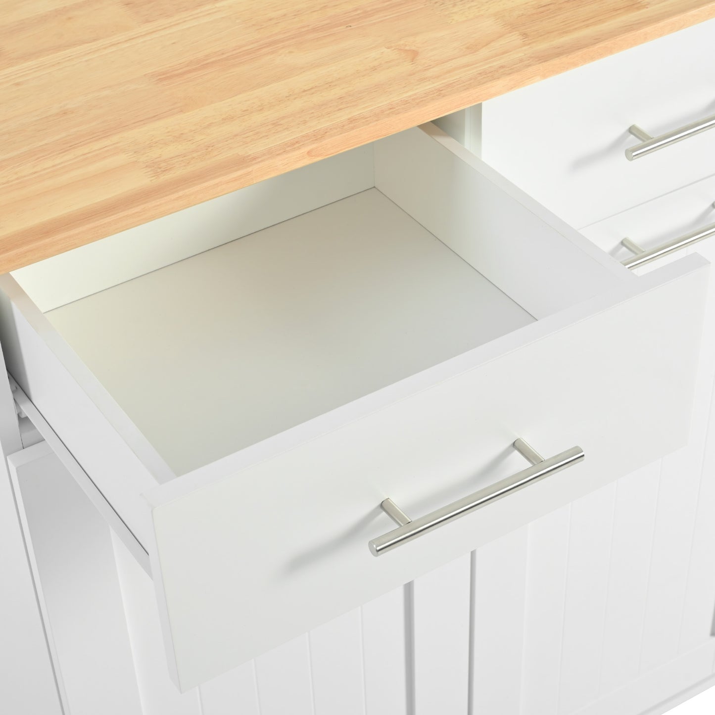 White kitchen cart with oak wood top featuring an open drawer and silver hardware