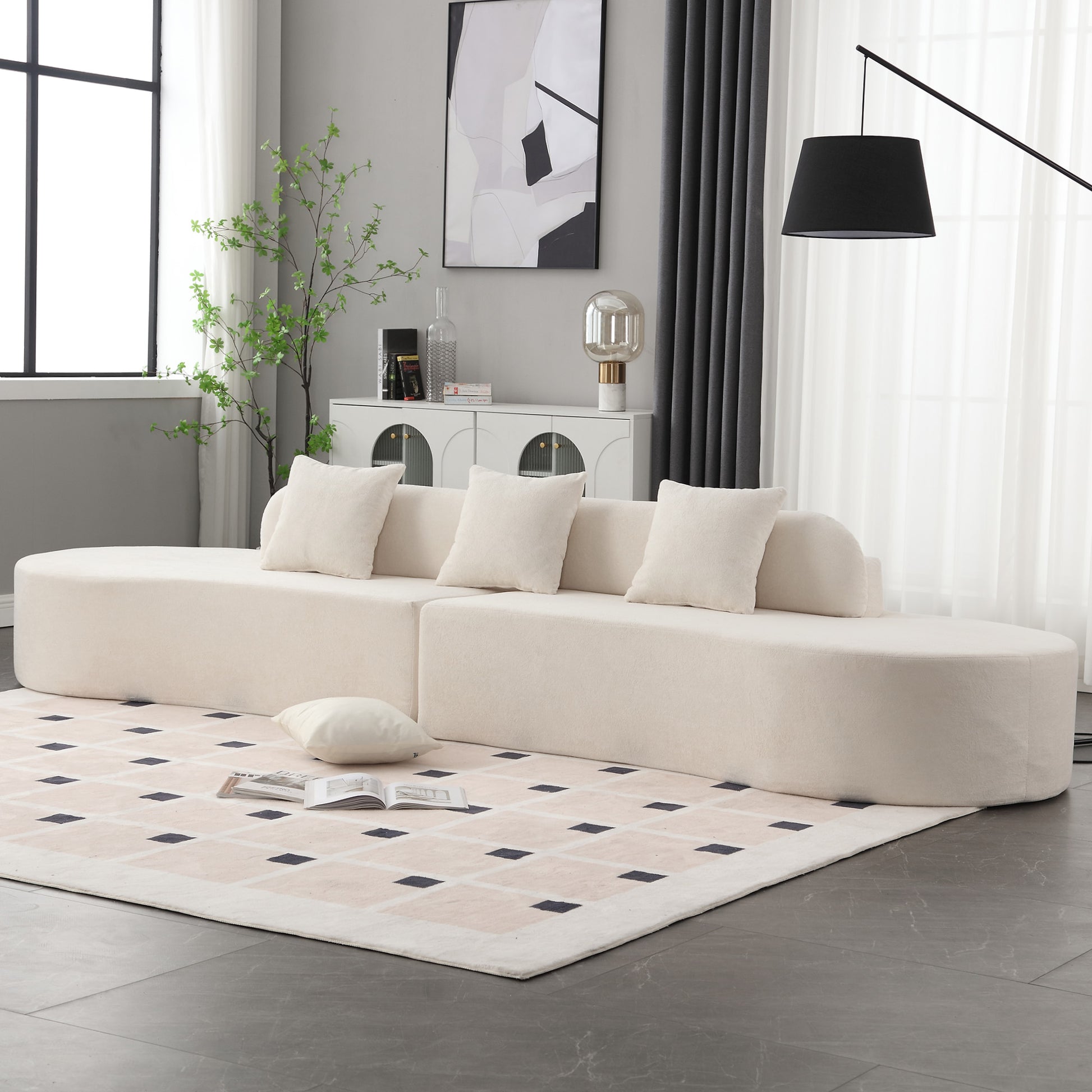 Cream boucle modular sofa with curved arms and plush cushions modern living room