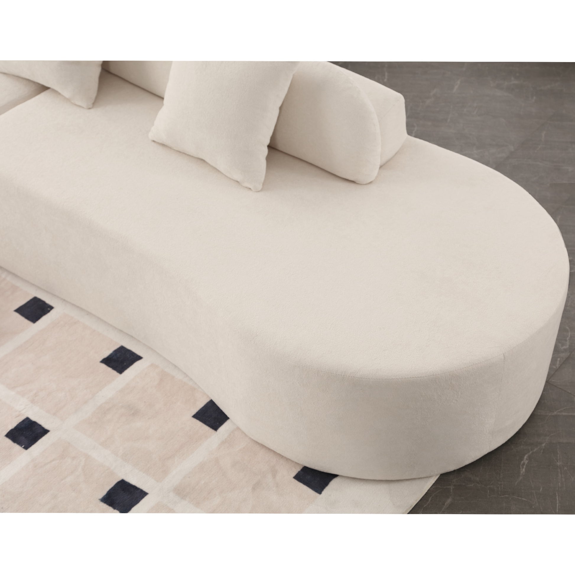 Cream boucle fabric chaise lounge with plush cushions and modern design