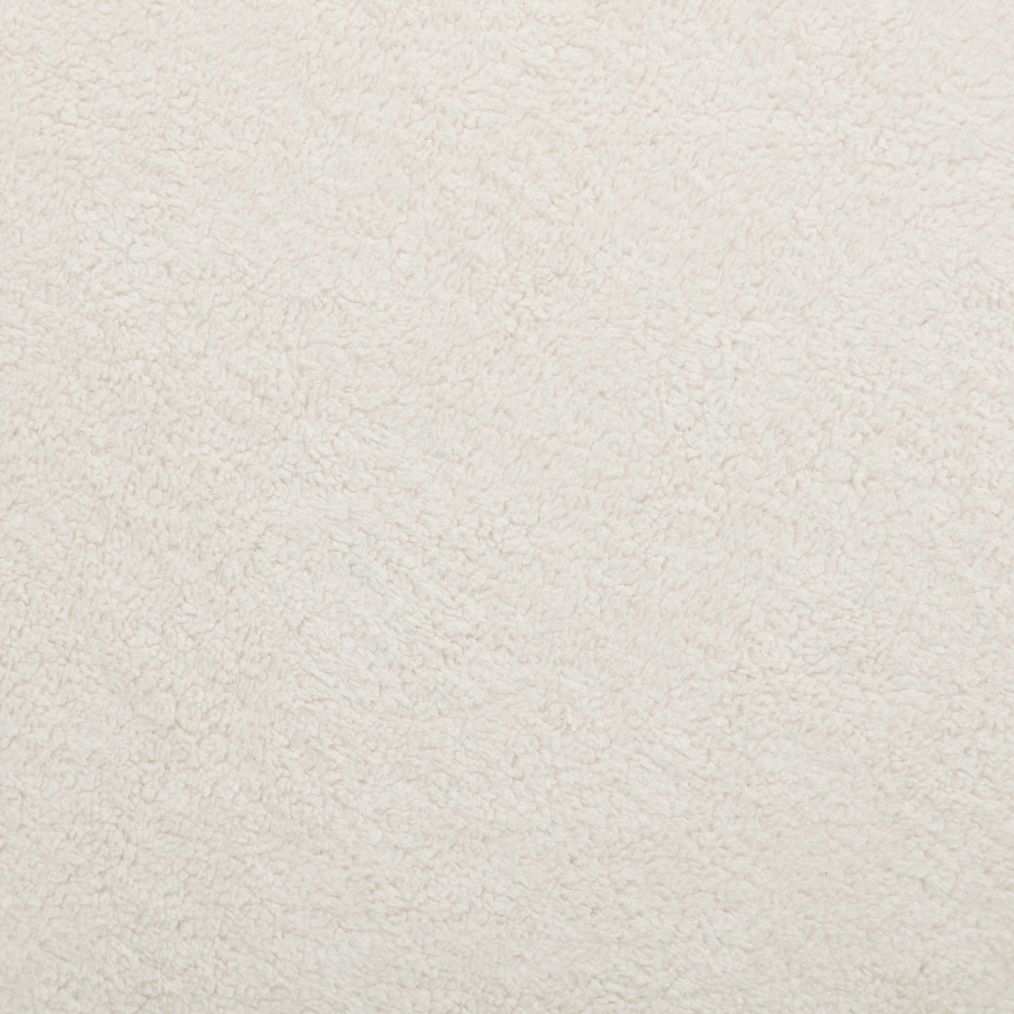 Cozy cream sherpa fabric swatch with fluffy texture for crafting projects
