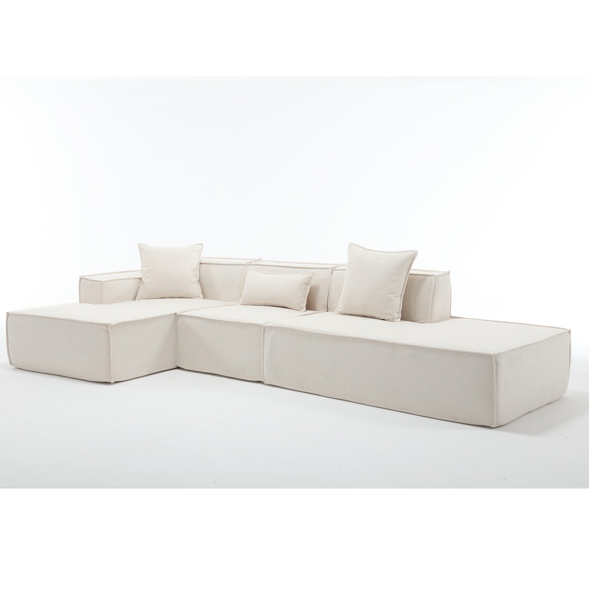 Modular sectional sofa in a light beige fabric featuring deep seats and plush cushions for ultimate comfort