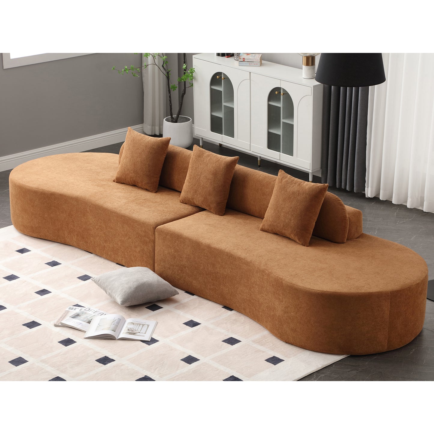 Curved modular velvet sofa in warm brown perfect for modern living room seating