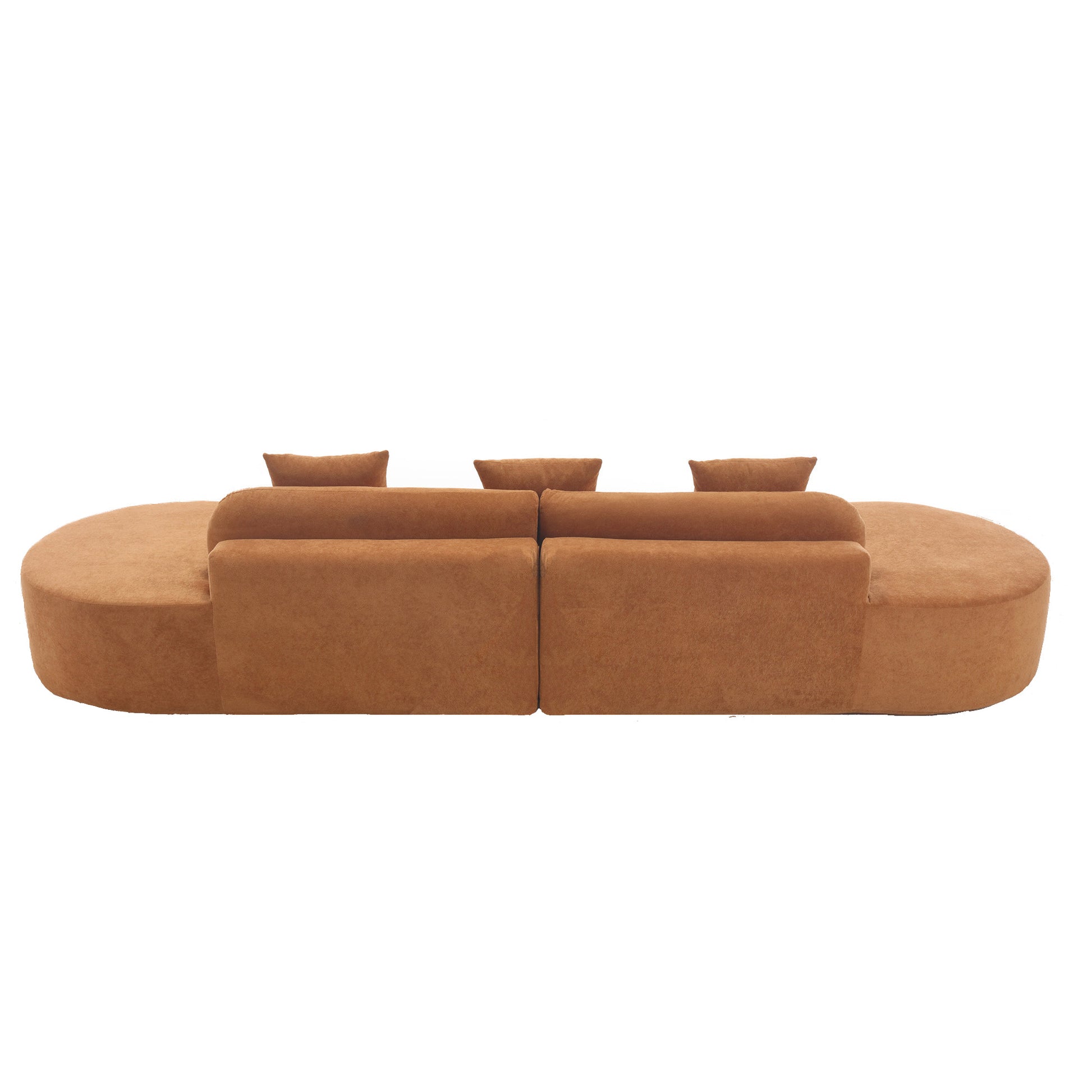 Modular brown velvet sectional sofa with curved armrest and accent pillows