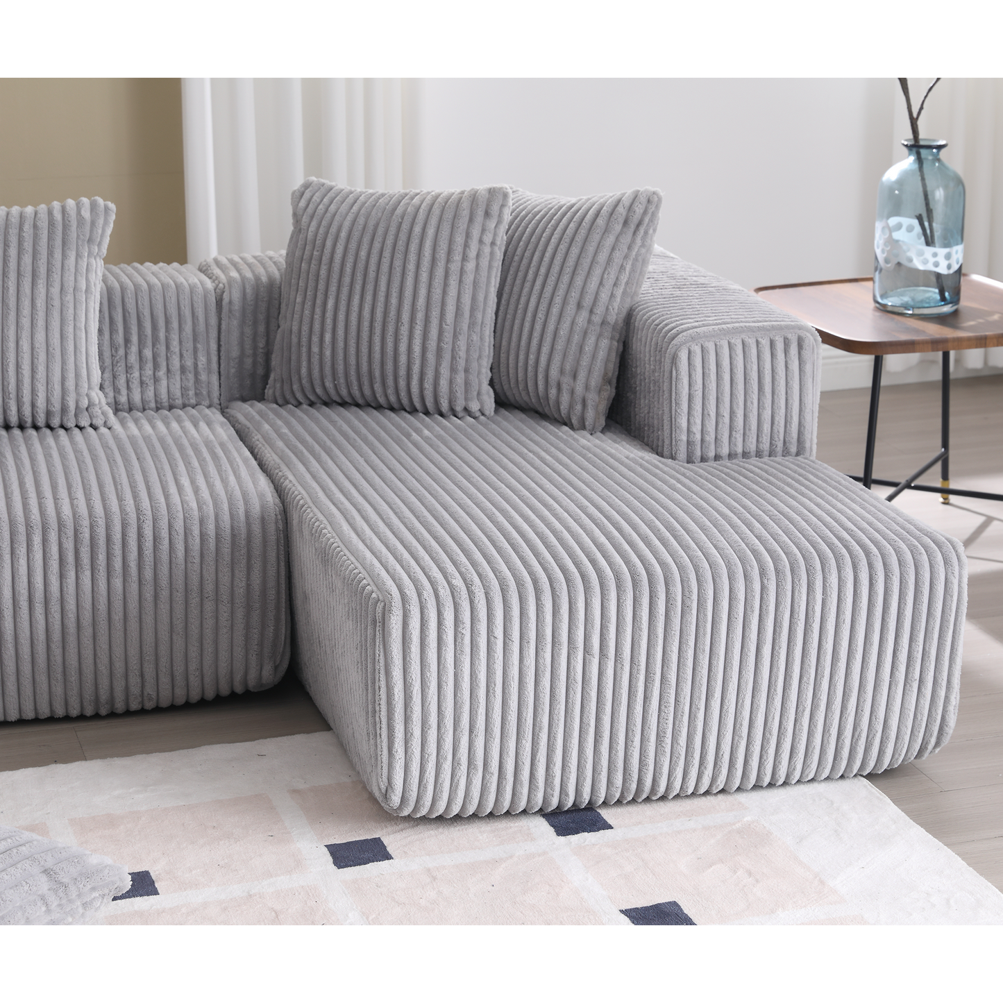 Plush corduroy sectional sofa in light gray with thick vertical ribbed texture modern design