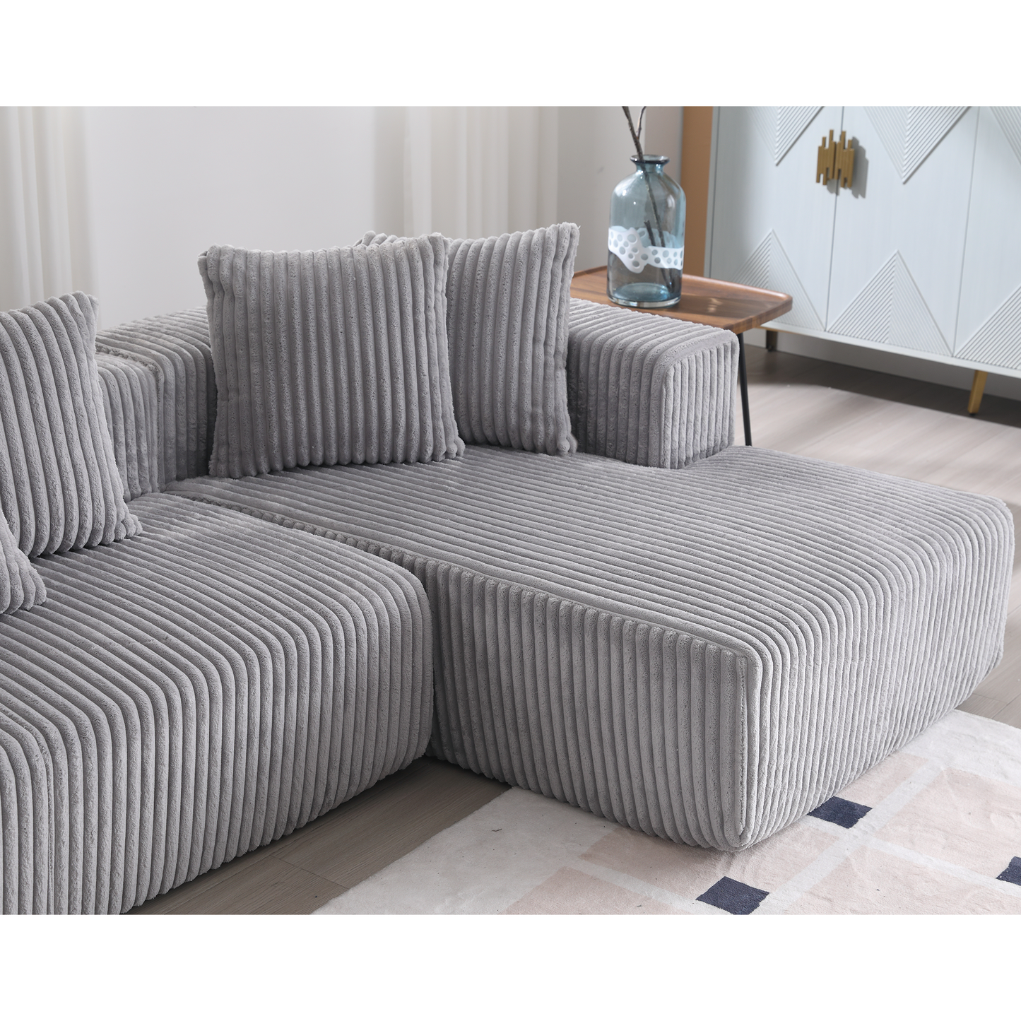 Grey corduroy modular sectional sofa with plush cushions perfect for modern living rooms