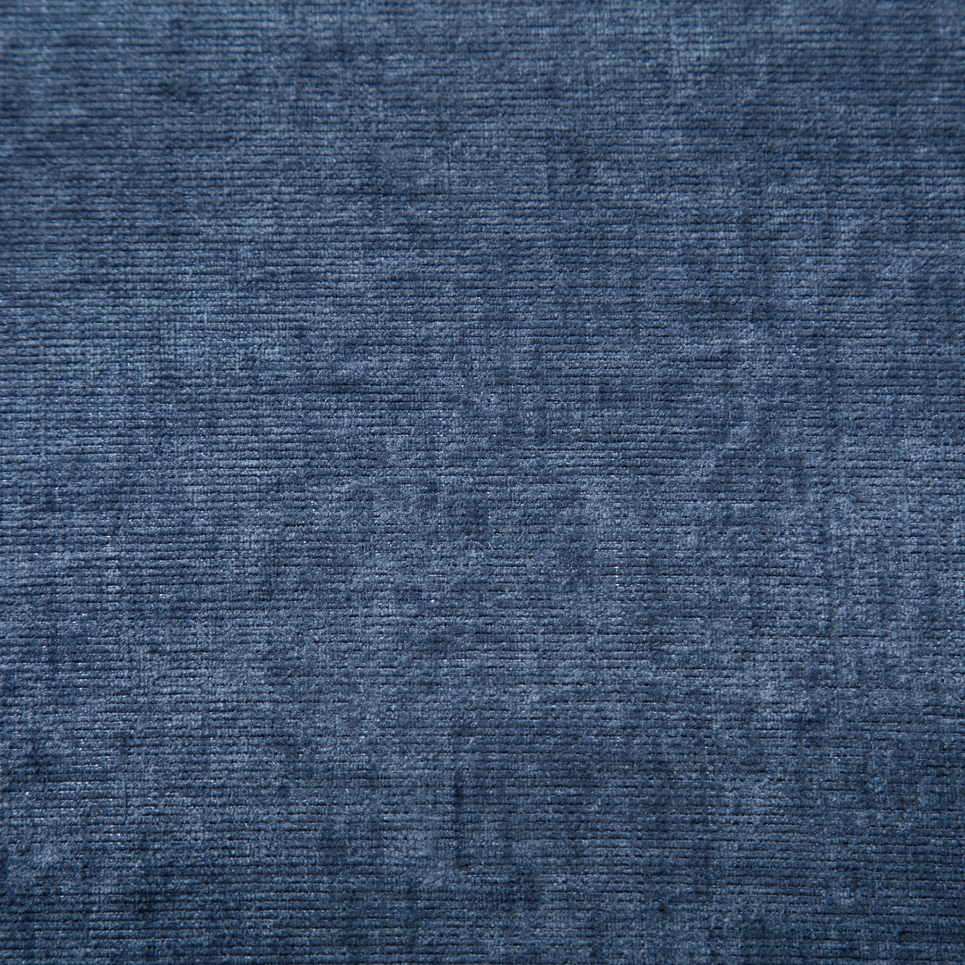 Navy blue corduroy fabric texture with subtle sheen ideal for upholstery