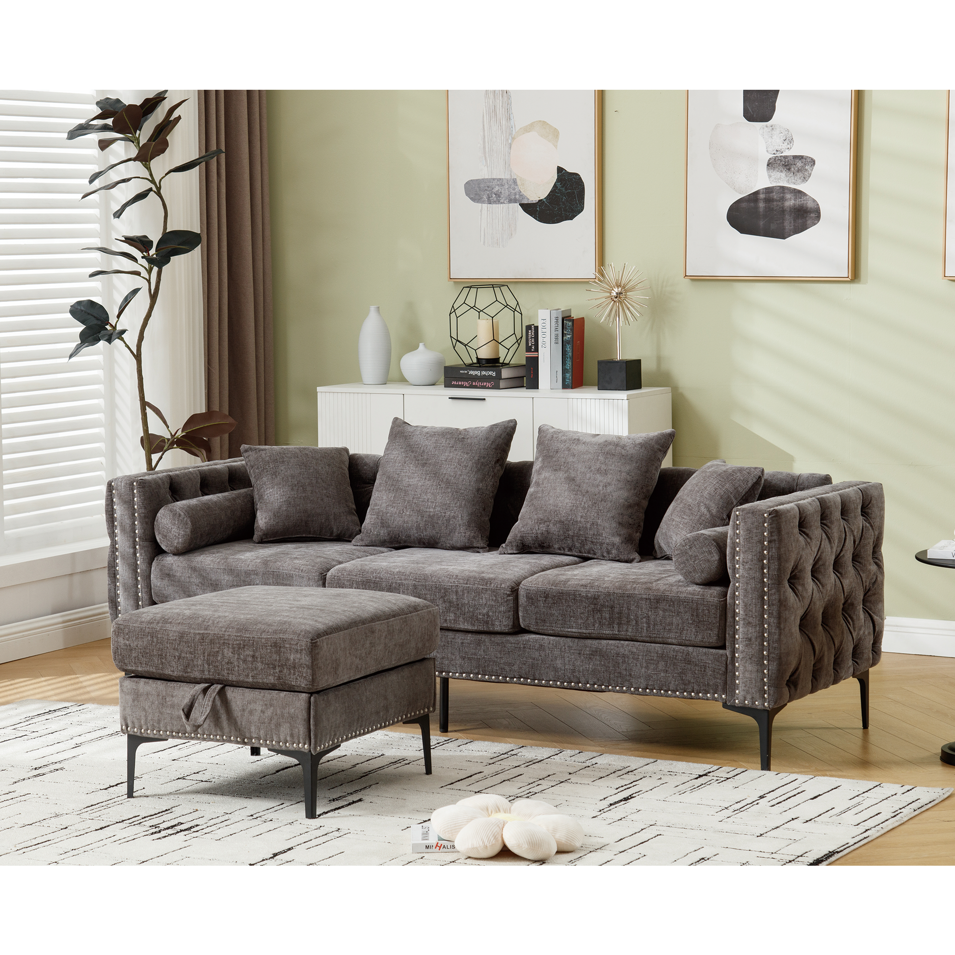 Dark grey tufted velvet sofa with nailhead trim and matching ottoman perfect for living room seating