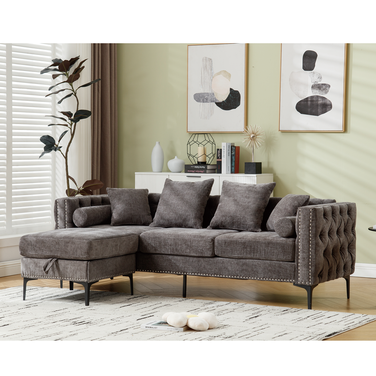 Gray tufted sectional sofa with chaise and silver nailhead trim ideal for living rooms