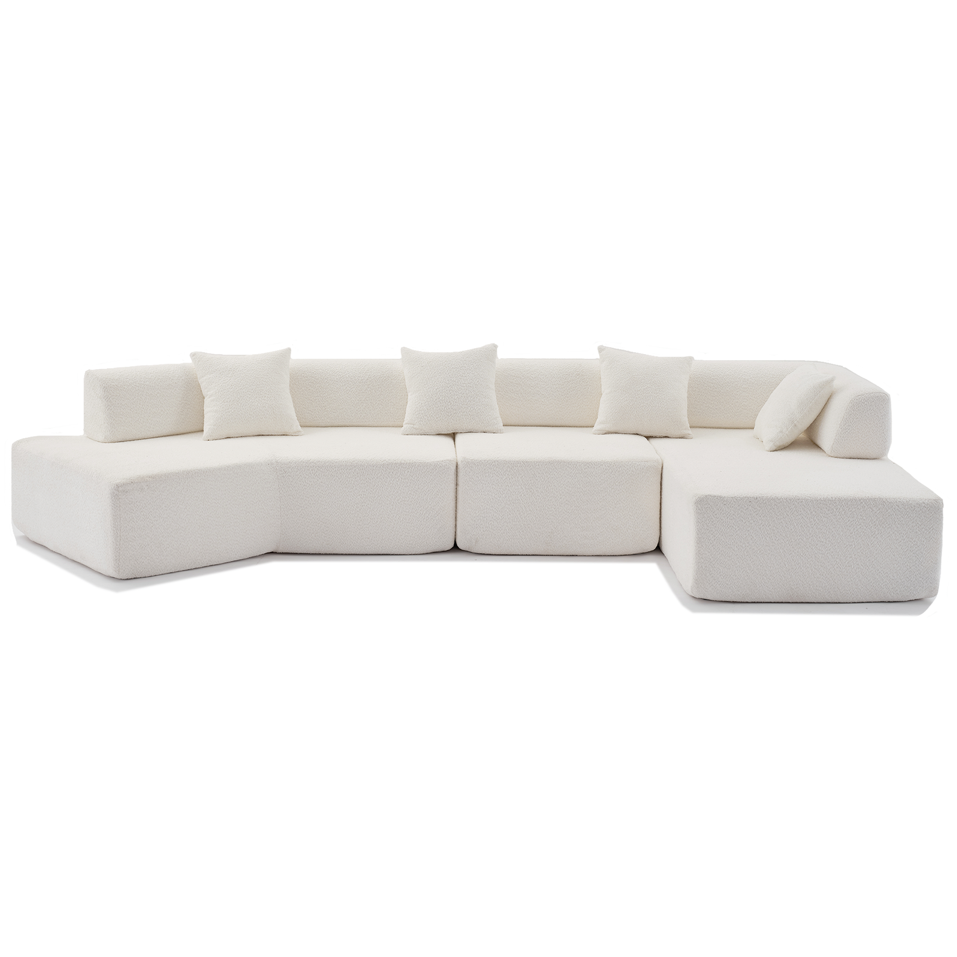 White boucl sectional sofa with modular seats and plush throw pillows