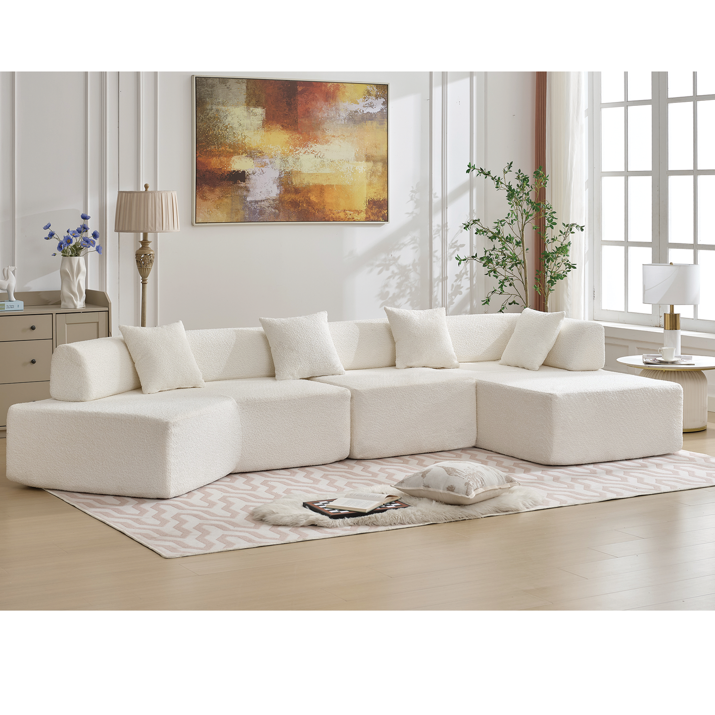 Cream boucle sectional sofa with modern lowprofile design for a spacious living room