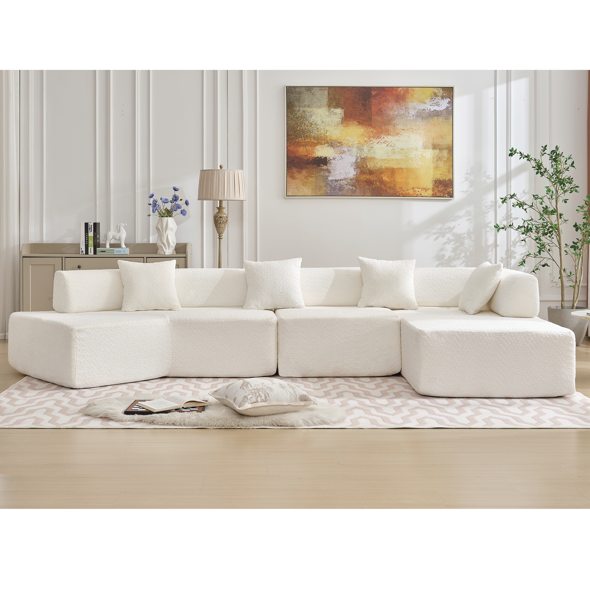 Modern offwhite boucle sectional sofa with plush throw pillows for a cozy living room