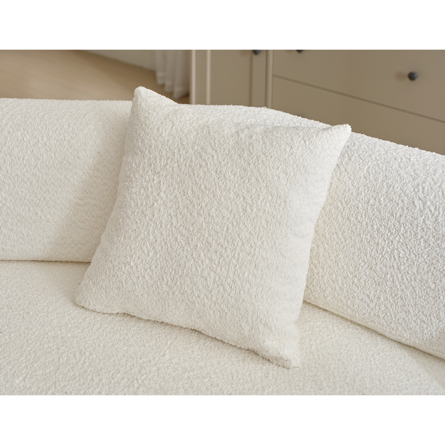 Cozy white boucl pillow with textured fabric perfect for modern sofa decor