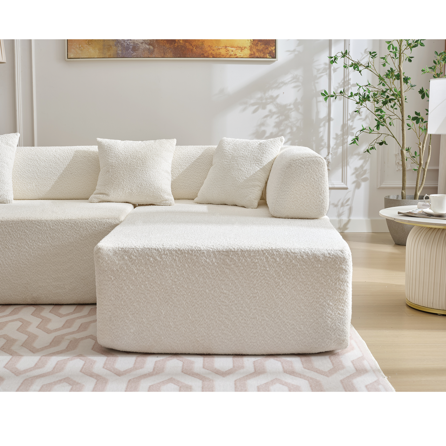 Plush cream sectional sofa with boucle fabric and accent pillows perfect for modern living rooms