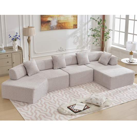 Light beige boucl sectional sofa with plush pillows perfect for a modern living room