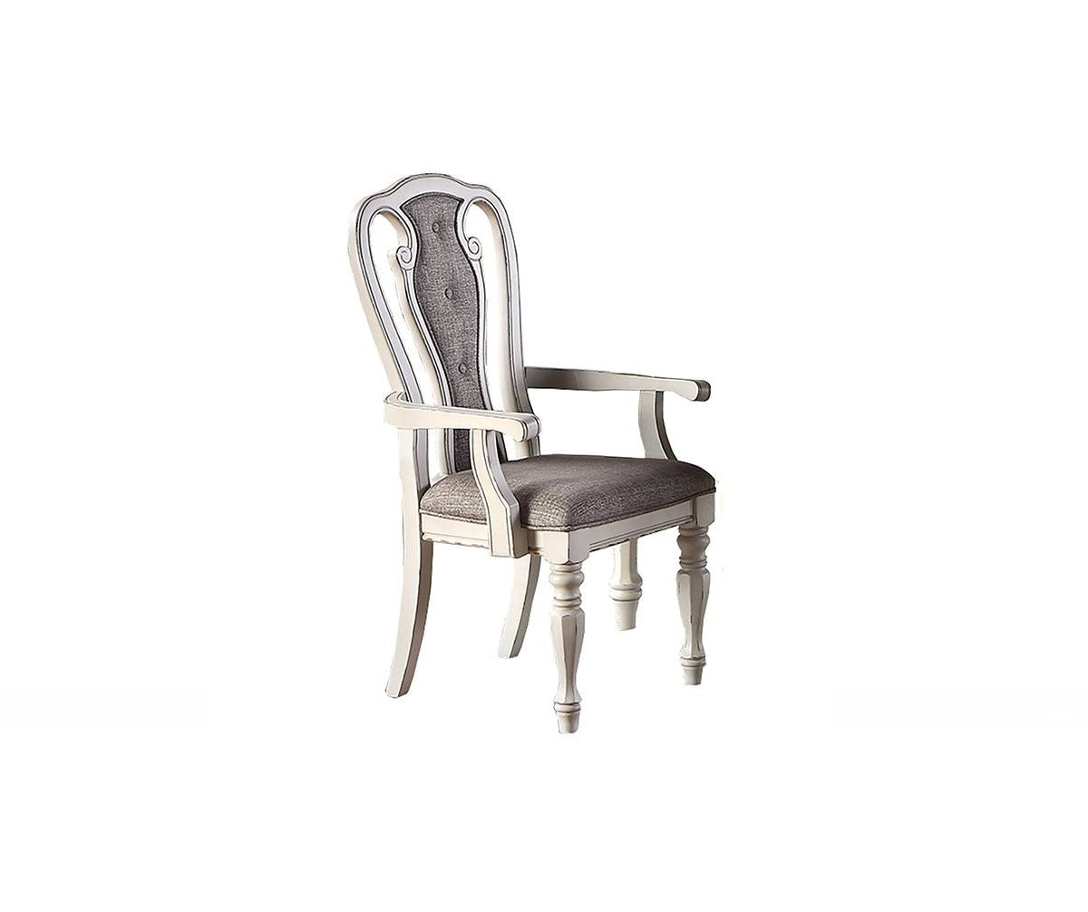 Ornate white dining chair with grey upholstered seat and back perfect for elegant dinners