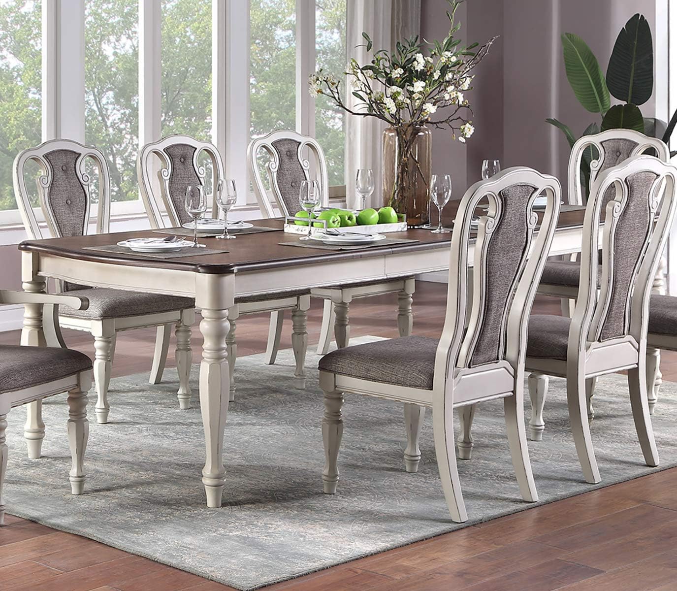 Distressed white and wood dining set with upholstered chairs for elegant dining