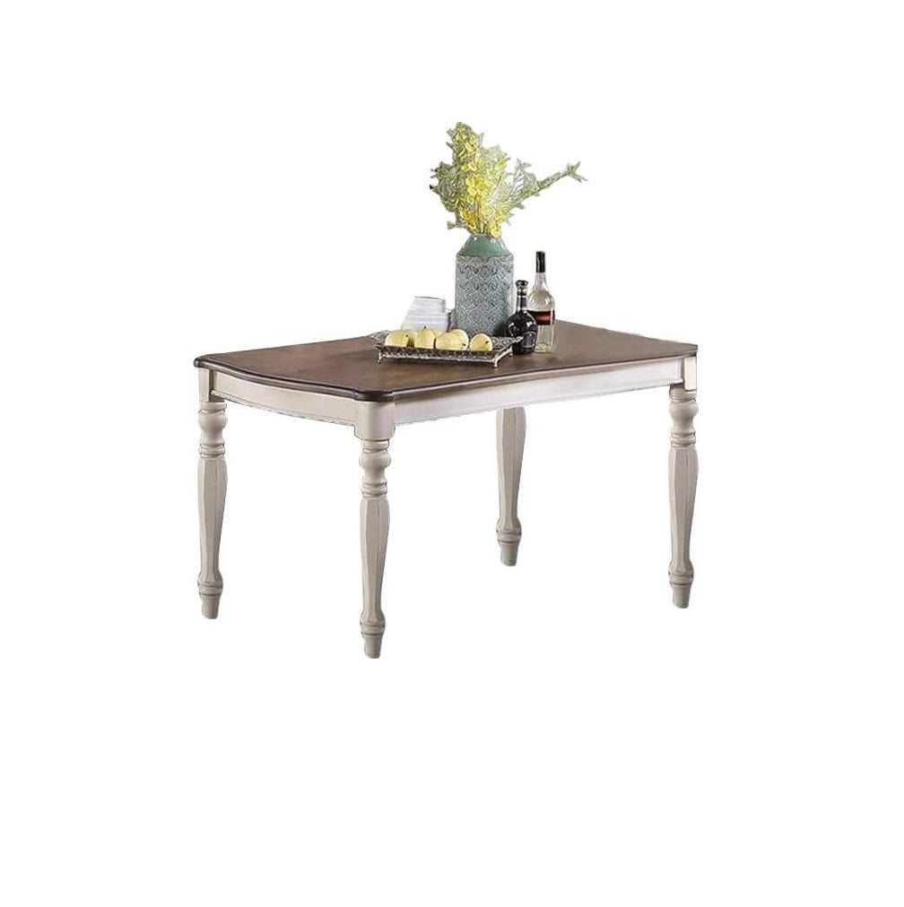 Rustic brown and cream dining table with ornate legs perfect for farmhouse kitchens