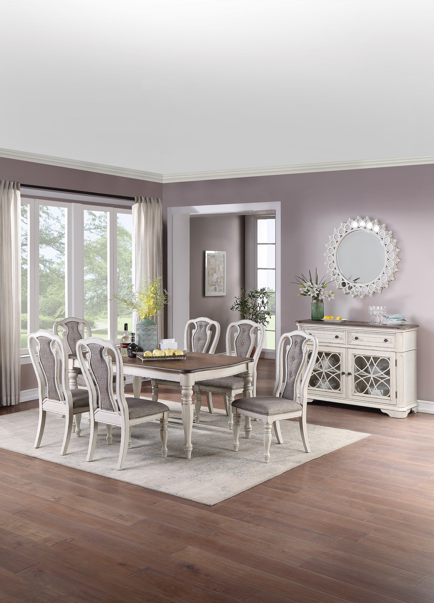 Tufted upholstered dining chairs with light grey fabric and white wood frames