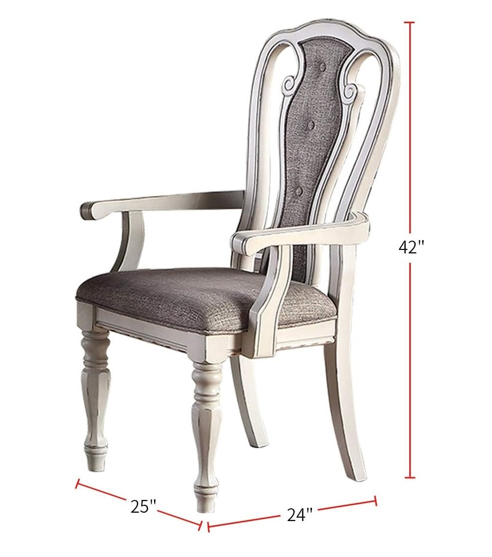 White upholstered dining chair with grey tufted back and carved legs