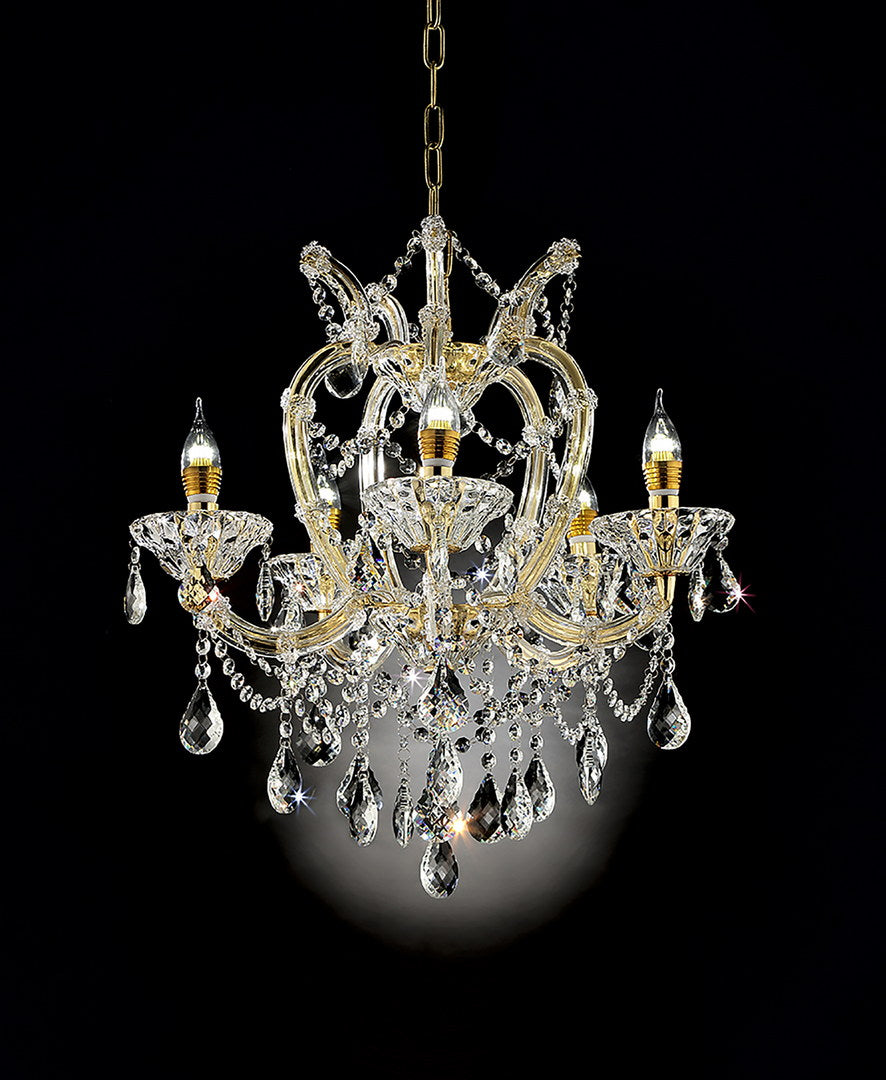 Elegant gold crystal chandelier with cascading teardrop prisms and candlestyle bulbs