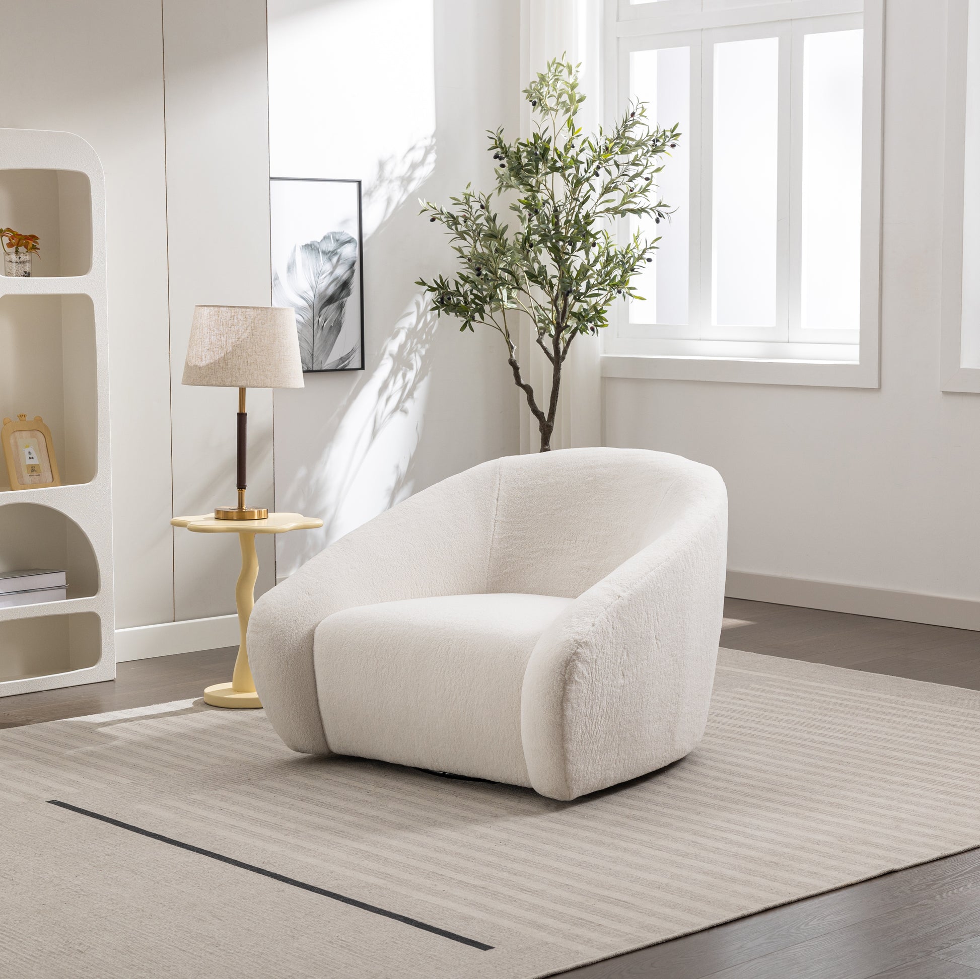 Plush cream armchair with rounded silhouette perfect for cozy living room accents