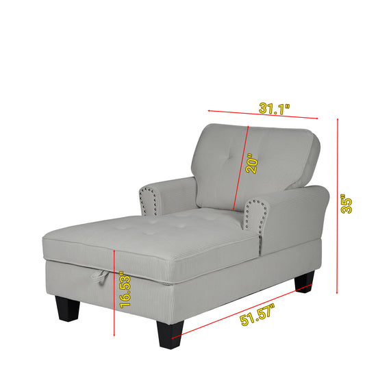 Light gray corduroy chaise lounge with tufted cushion and decorative nailhead trim