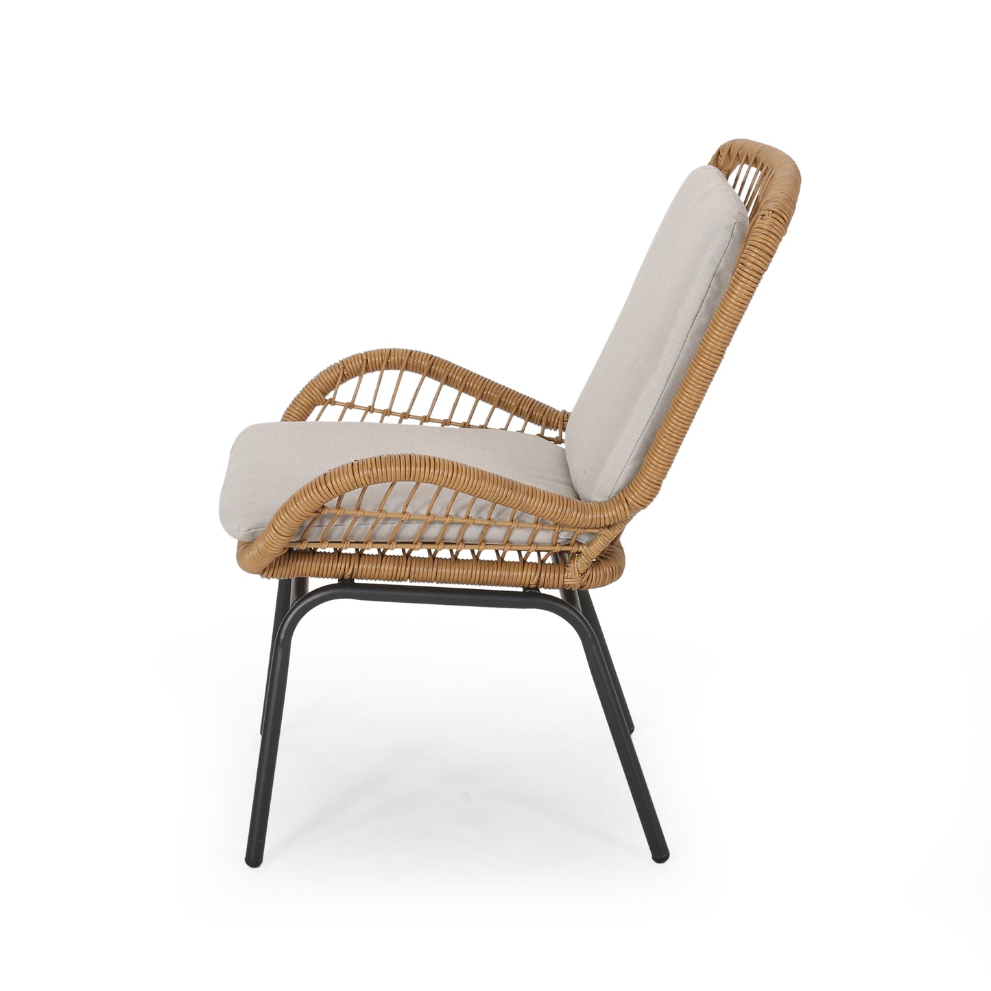 Woven rattan armchair with neutral grey cushion and black metal legs