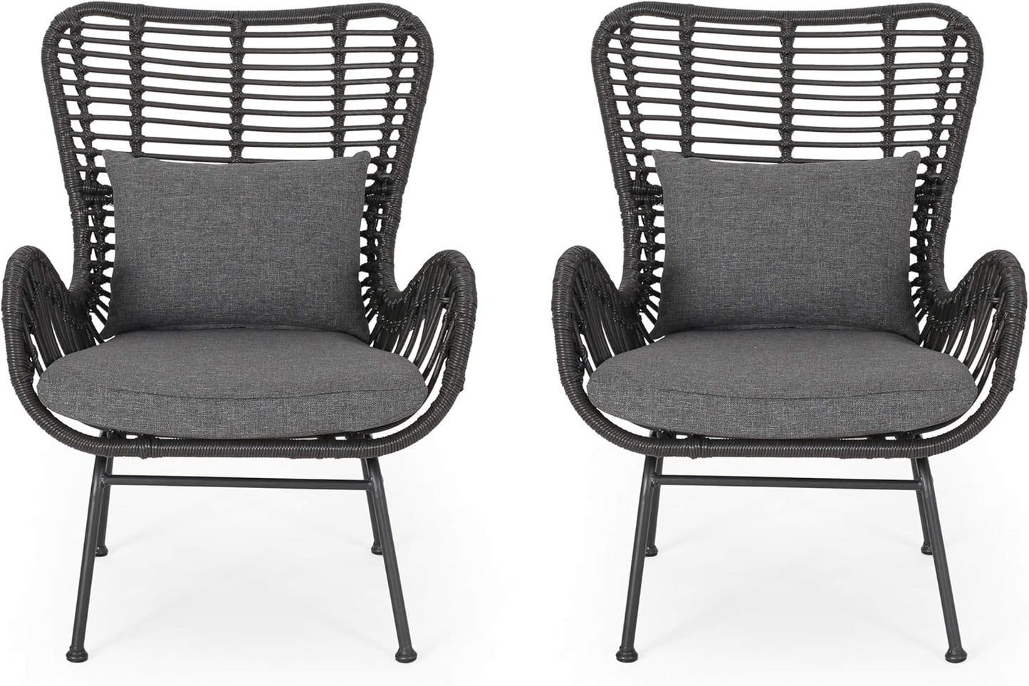 Two dark gray wicker outdoor chairs with charcoal cushions and pillows