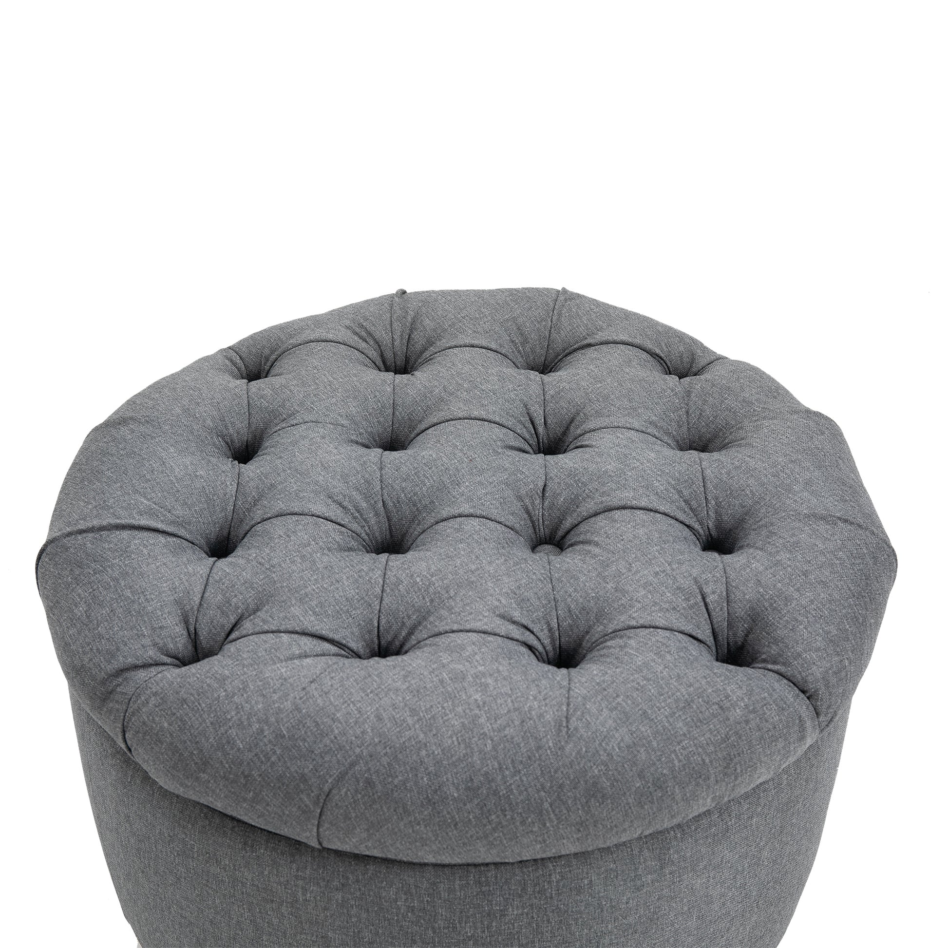 Round tufted grey fabric ottoman with button accents perfect for living room seating