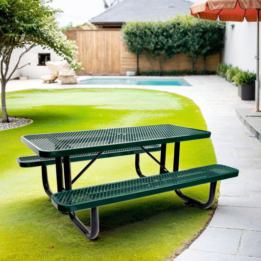 Green metal expanded mesh picnic table with attached benches on lawn