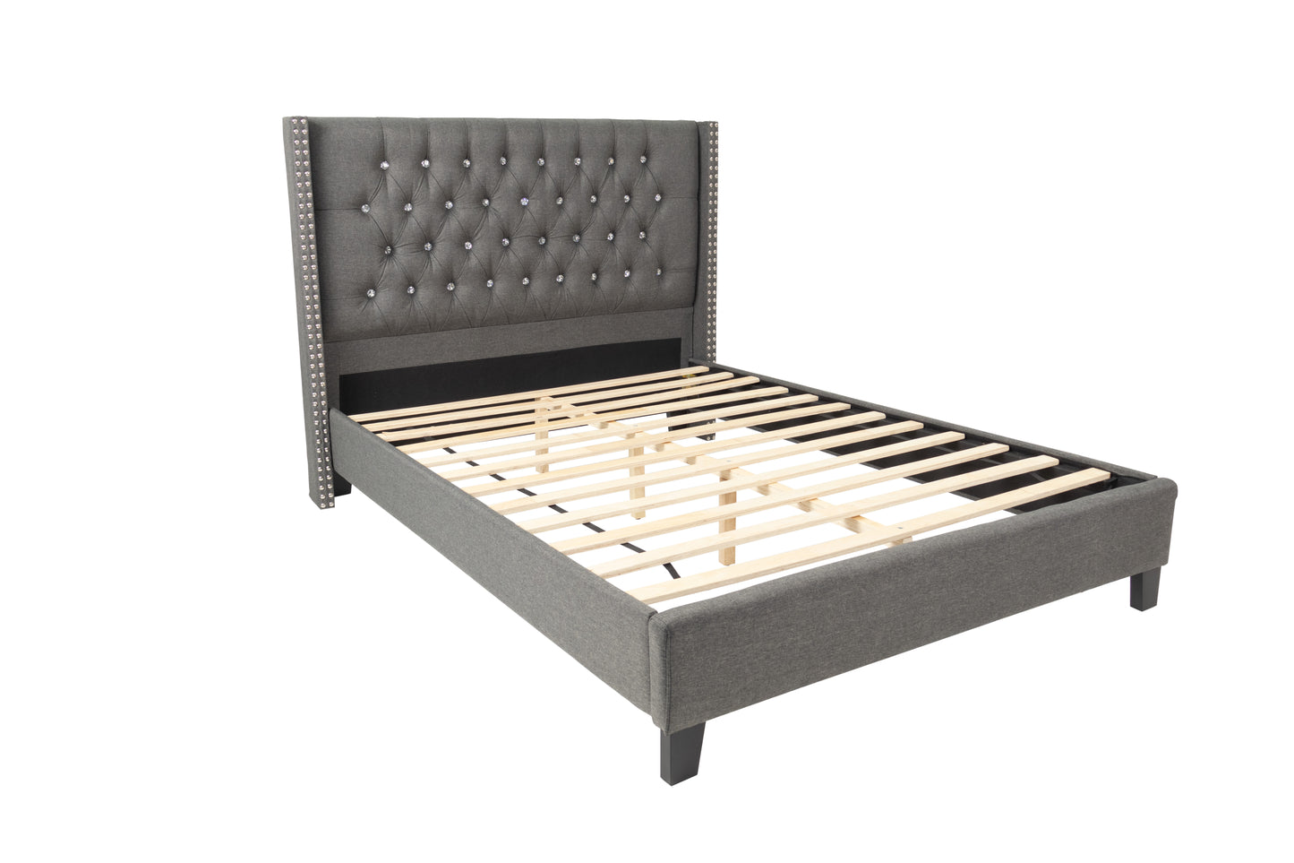 Tufted grey fabric bed frame with diamondshaped crystal tufting and silver nailhead trim
