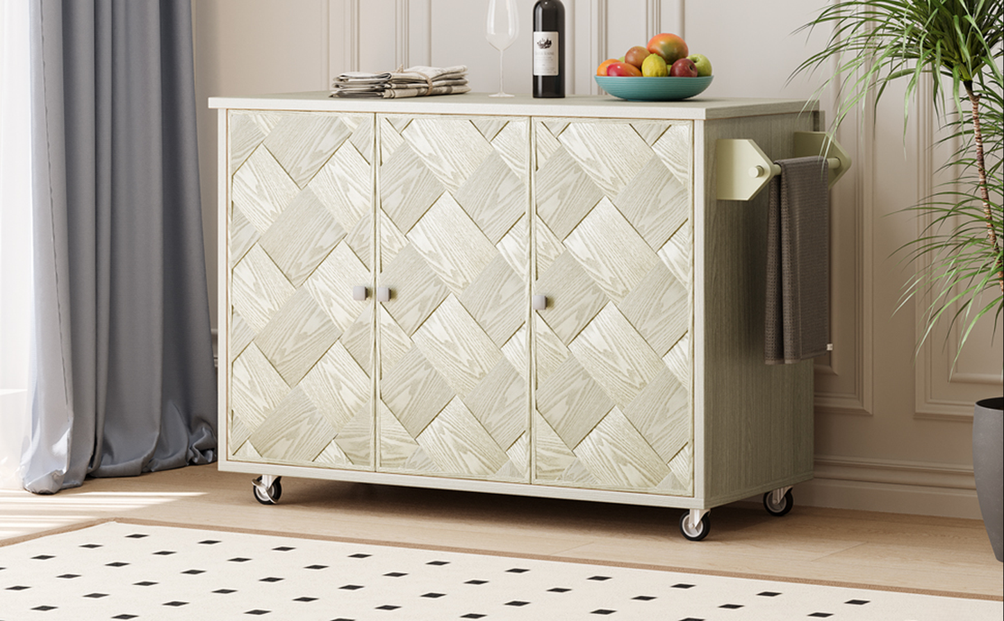 White herringbone cabinet with three doors and silver knobs on casters