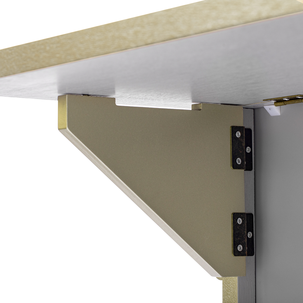 Bronze metal folding shelf bracket attached to a grey cabinet
