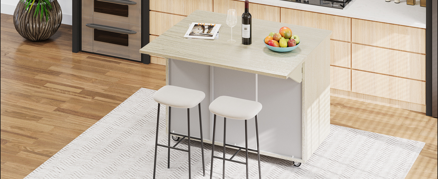 Compact kitchen island with two white stools and a fruit bowl