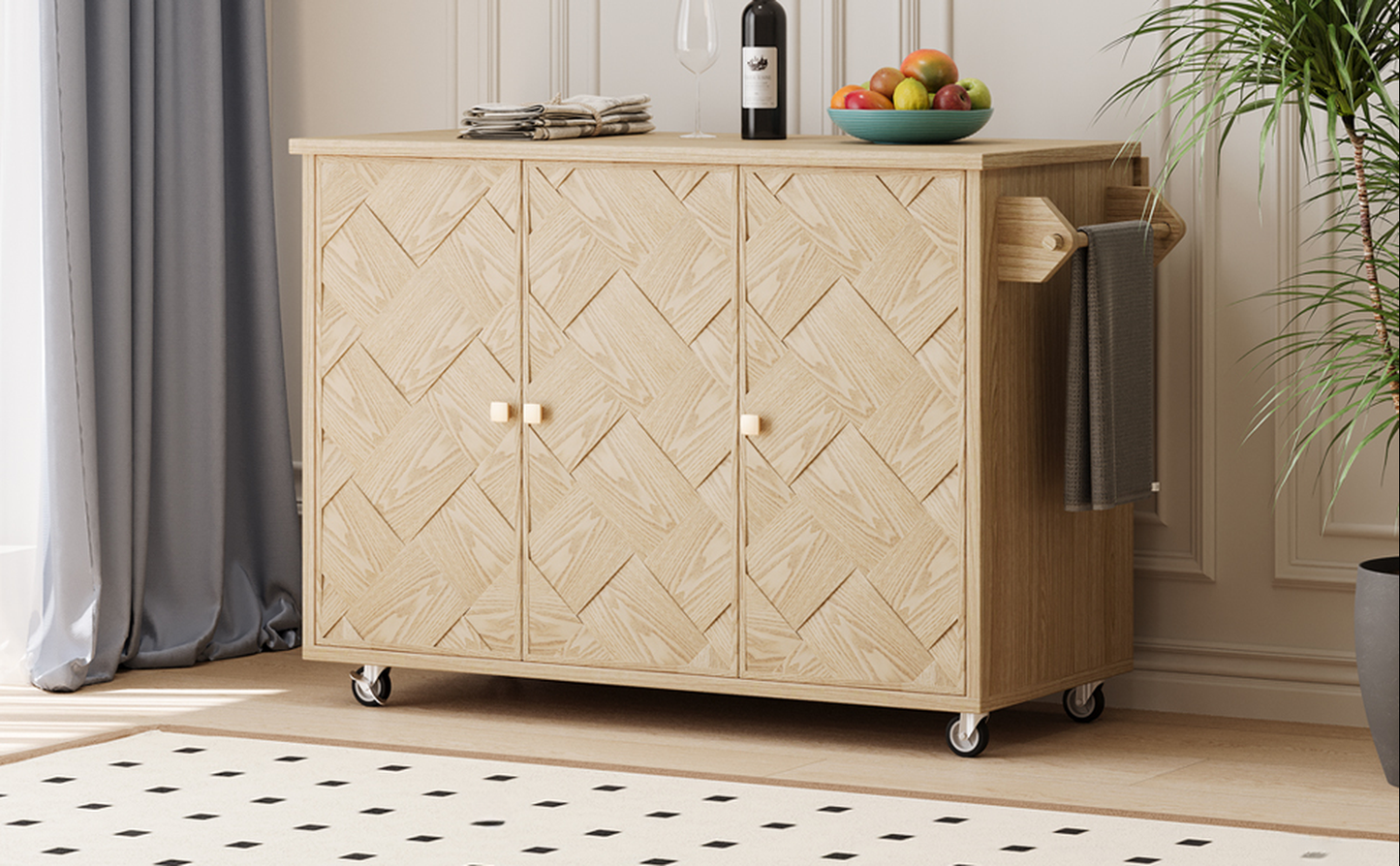 Light oak kitchen island with herringbone door pattern and brass knobs