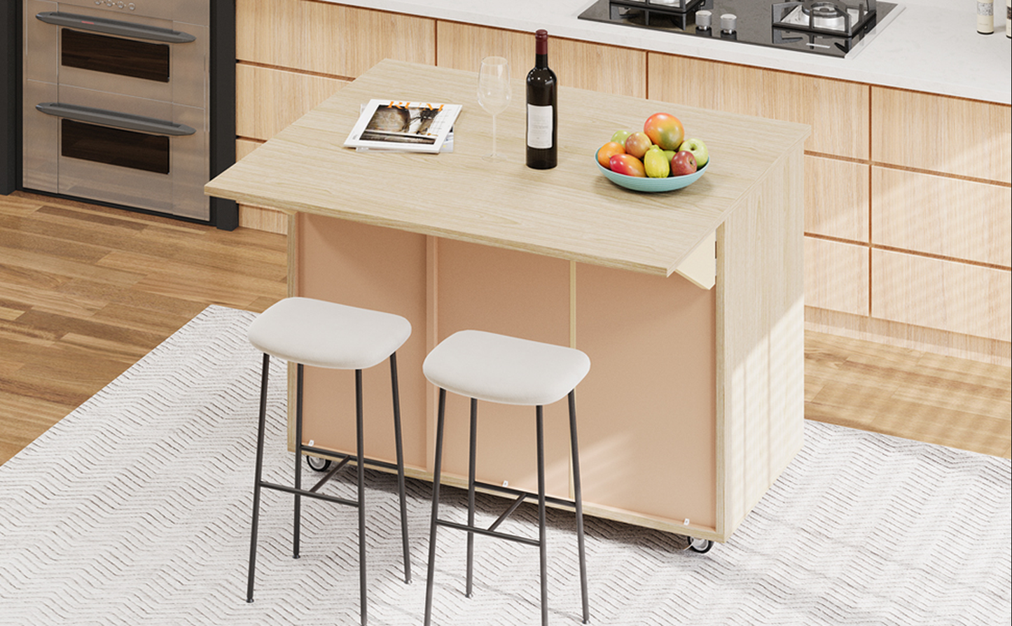 Light wood kitchen island with two white stools and fruit bowl