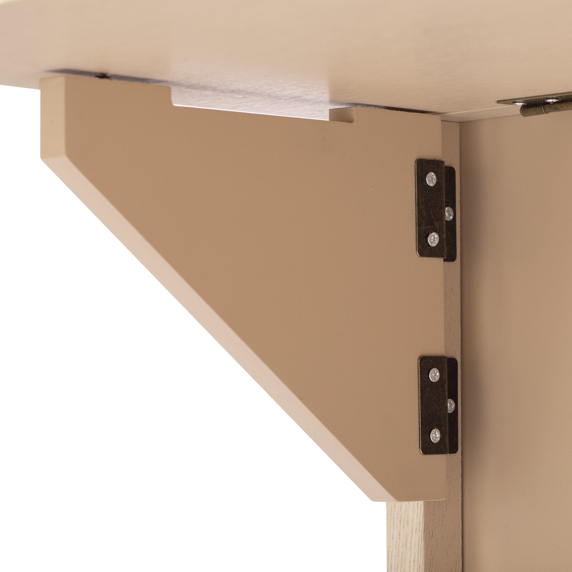Closeup of tan wooden furniture bracket with metal hinges and screws