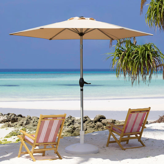 Beige patio umbrella with tilt mechanism and striped beach chairs