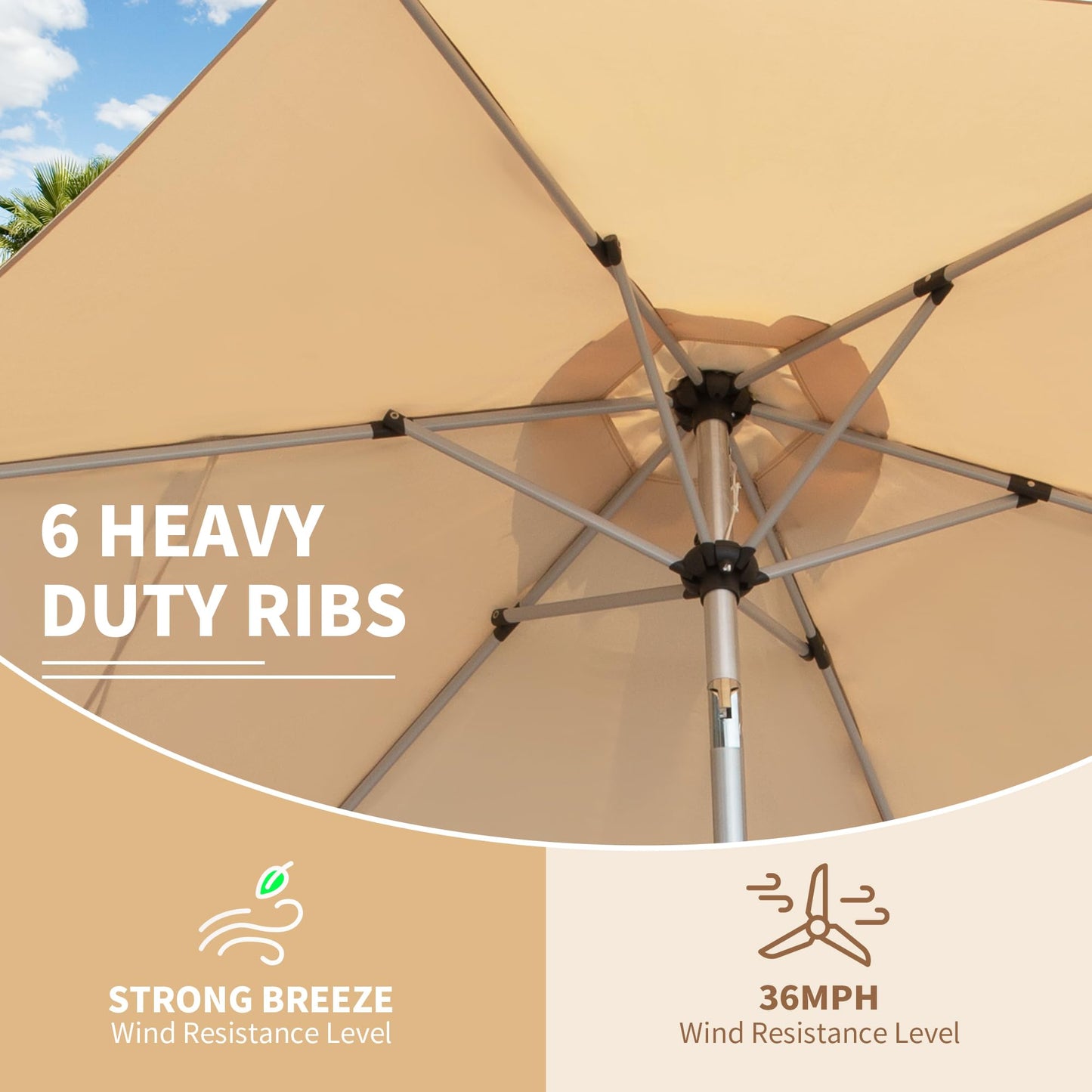 Tan outdoor patio umbrella featuring a strong sixrib metal frame
