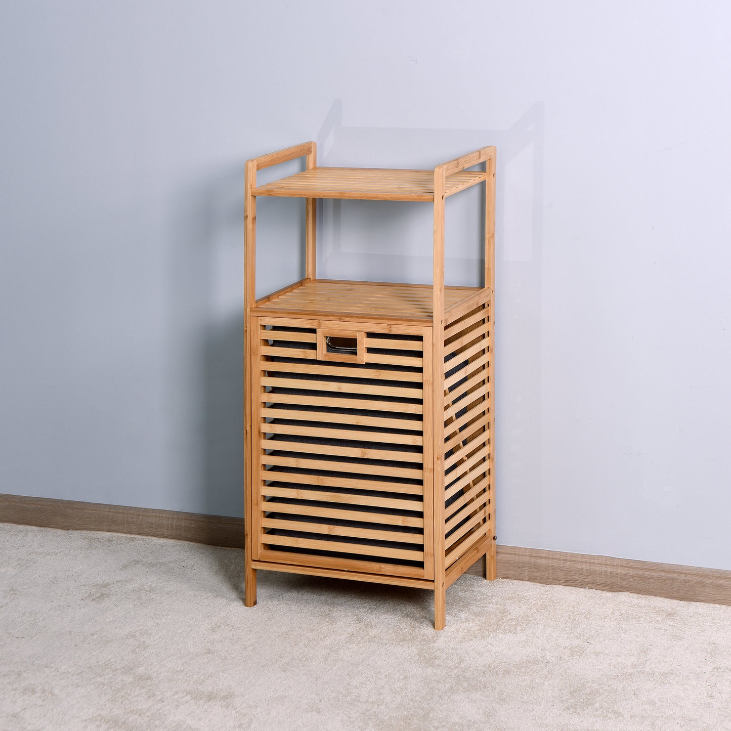 Natural bamboo laundry basket with two shelves and slatted design perfect for bathroom organization