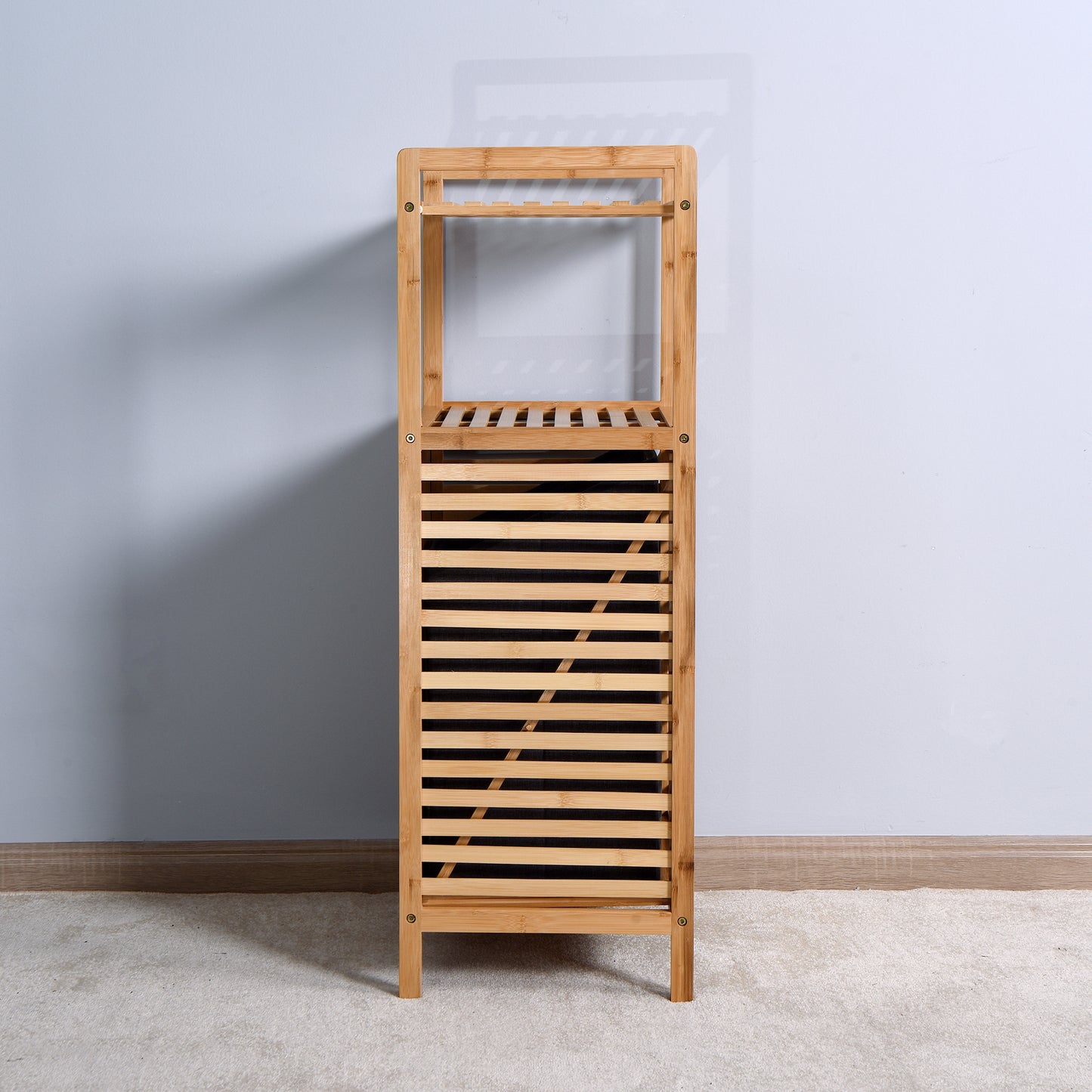 Tall bamboo slatted shelving unit with two shelves and a louvered bottom compartment