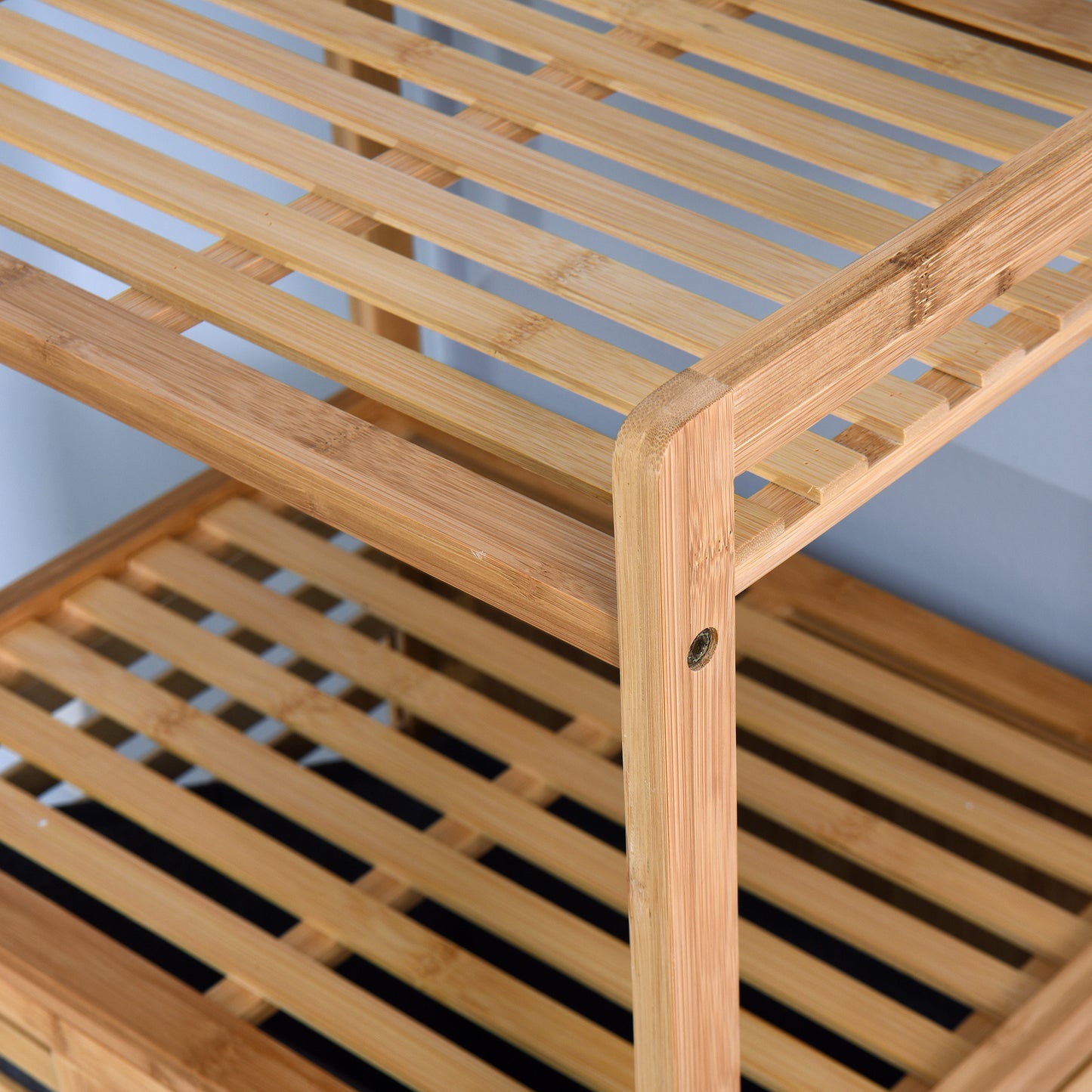 Natural bamboo tier shelf with slatted design ideal for bathrooms or kitchens