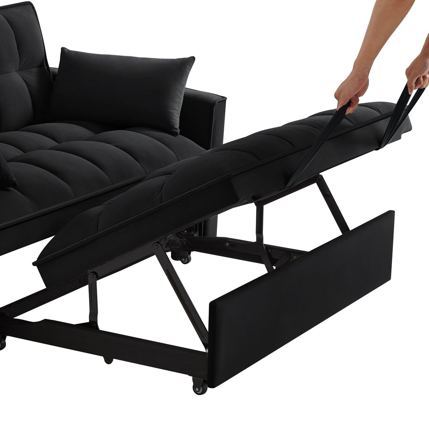 Black tufted futon sofa with pullout bed mechanism in action