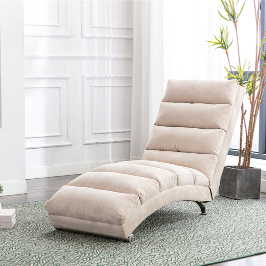 Beige upholstered chaise lounge with tufted cushioning for relaxation