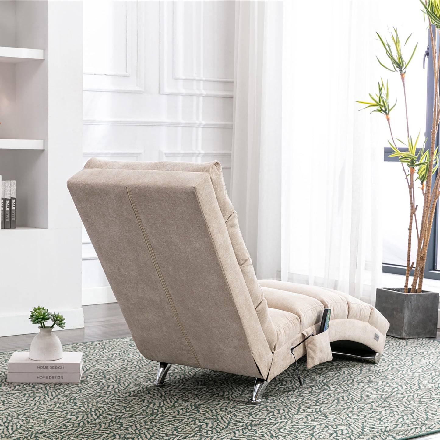 Beige adjustable recliner chair with plush fabric and chrome legs in a living room setting