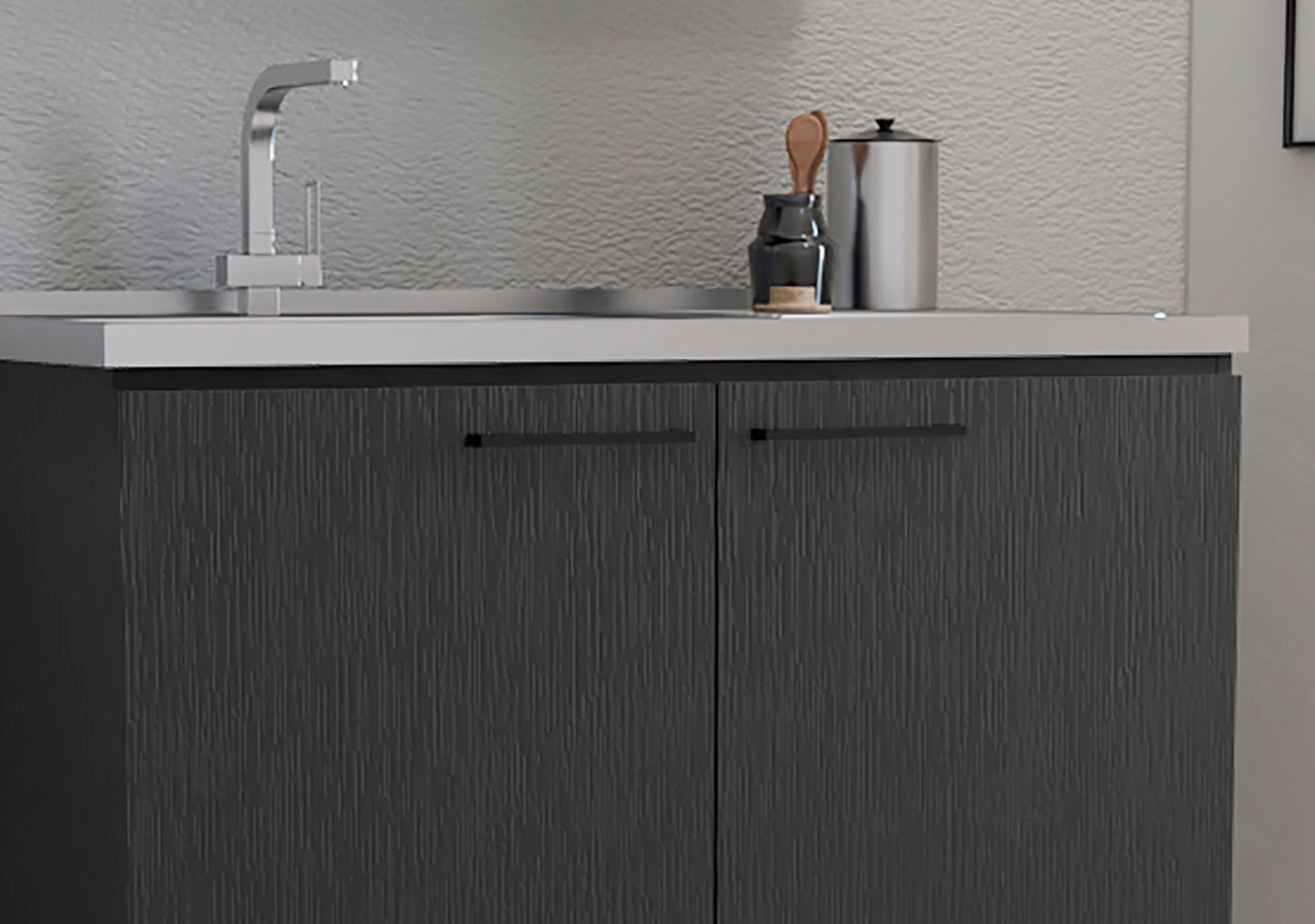 Modern dark gray textured kitchen cabinet with sleek black handles and chrome faucet